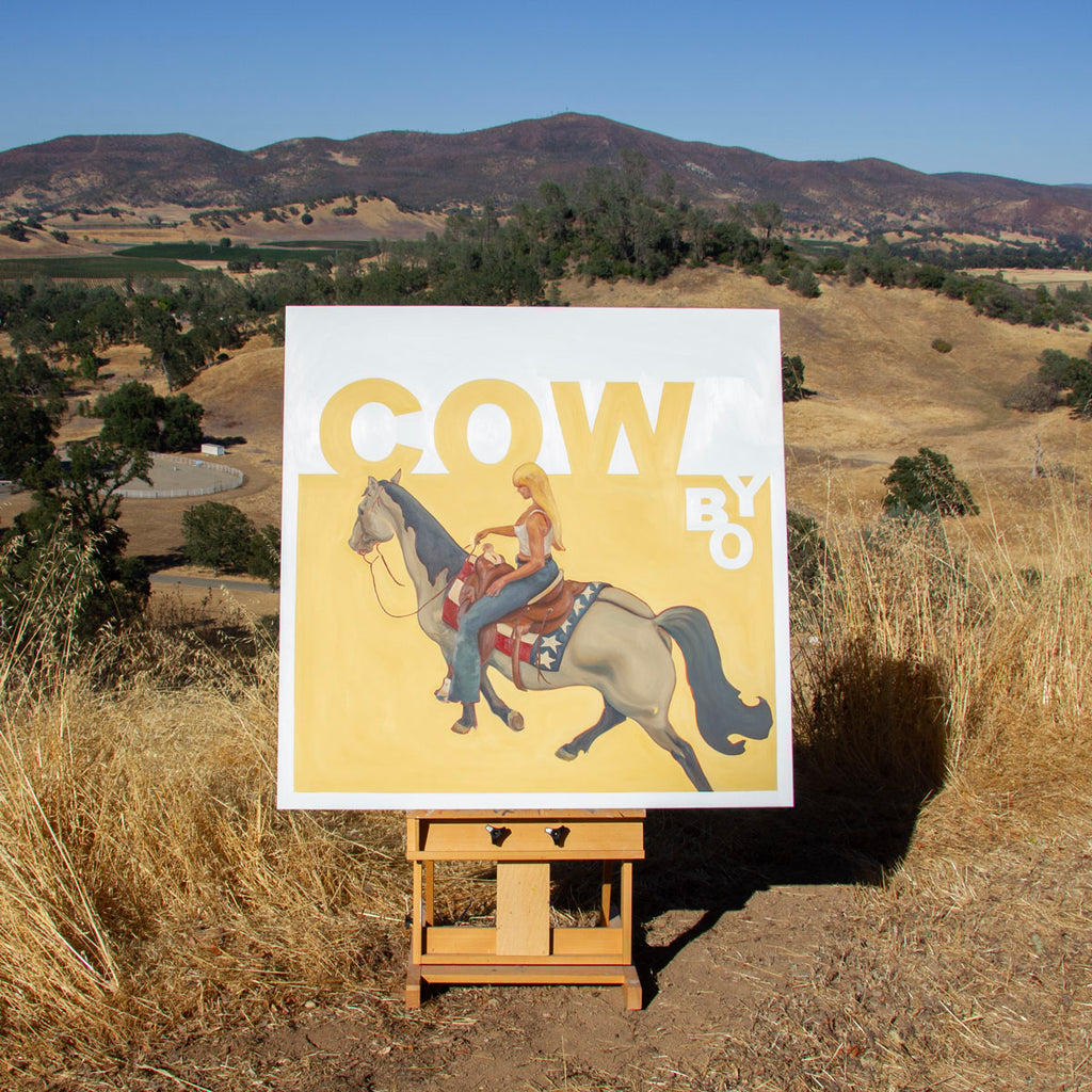 Painting of cowgirl on yellow background