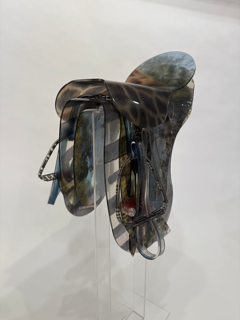 English saddle sculpture with giraffe print