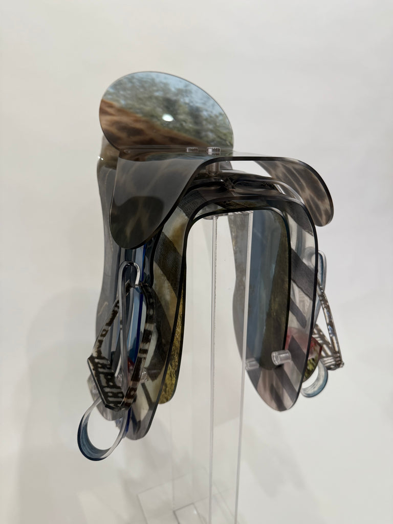 English saddle sculpture with giraffe print