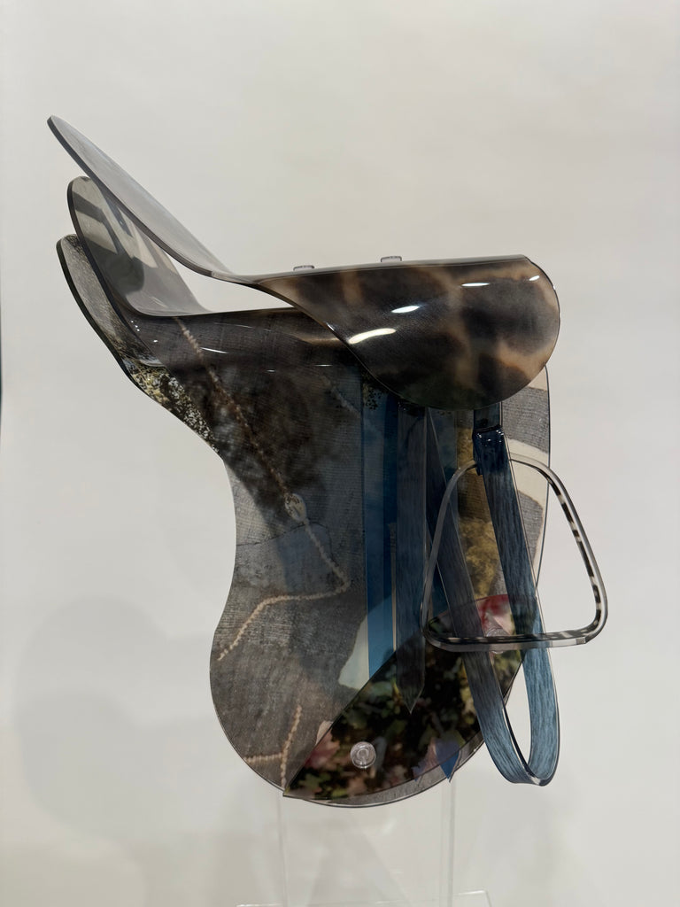 English saddle sculpture with giraffe print