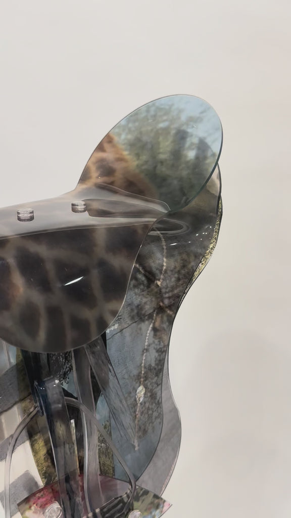 English saddle sculpture with giraffe print 
