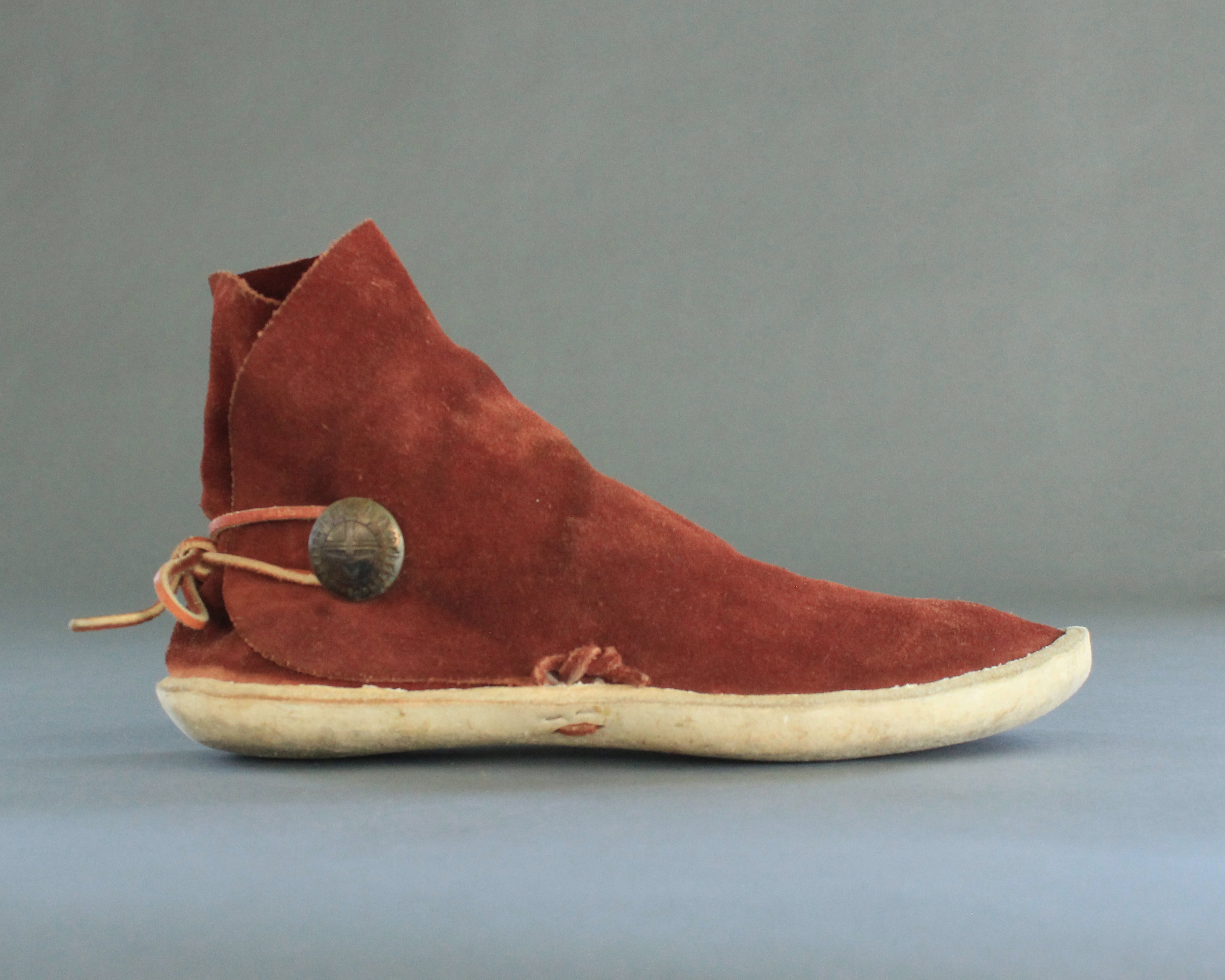 vintage high top moccasins with rawhide sole 