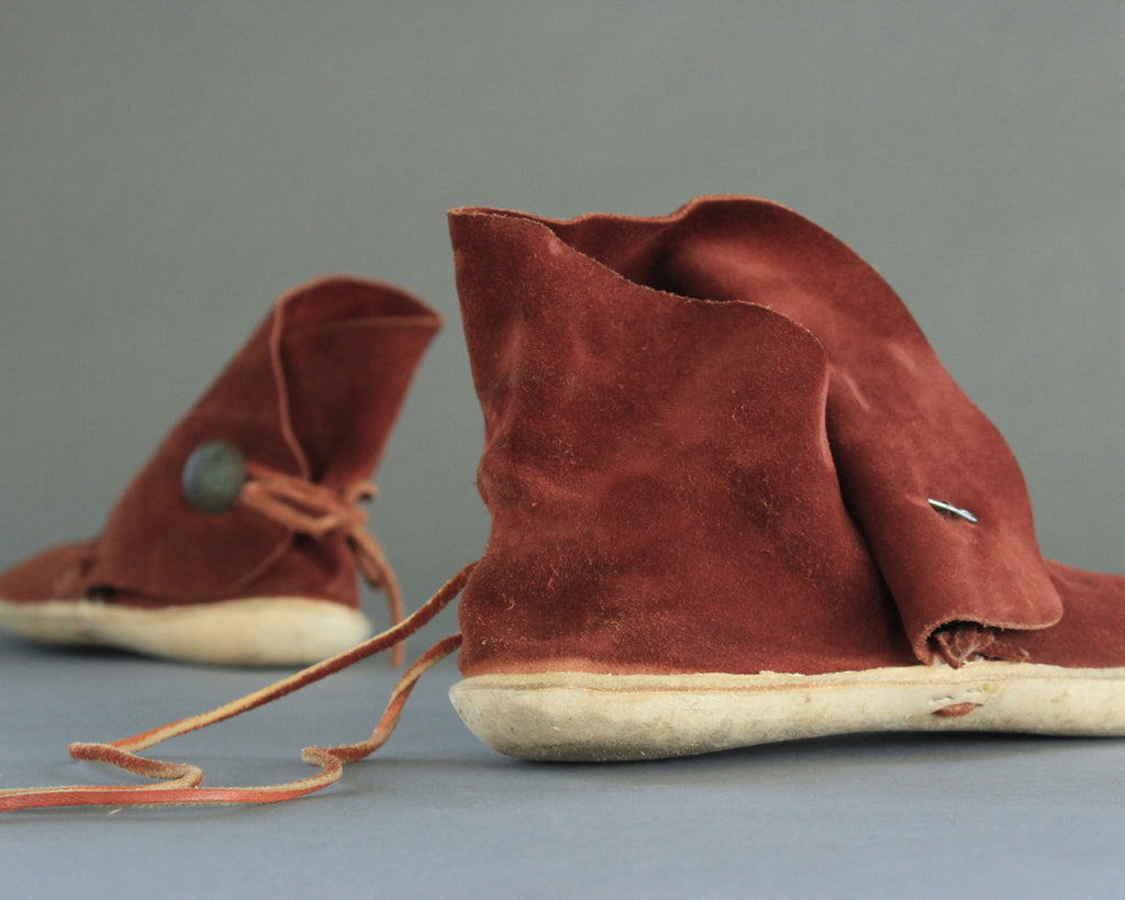 vintage high top moccasins with rawhide sole 