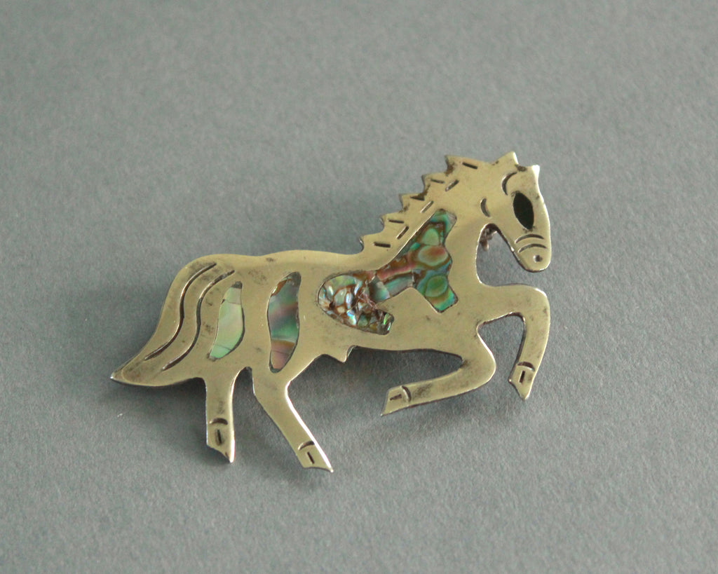 rearing horse abalone brooch
