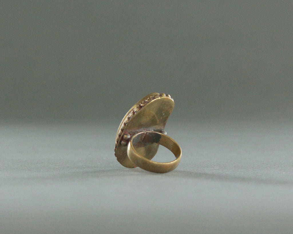vintage brass statement ring with red stone