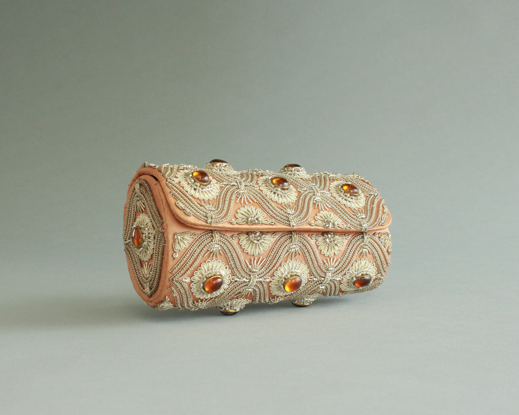 Elegant beaded evening clutch in gold and peach