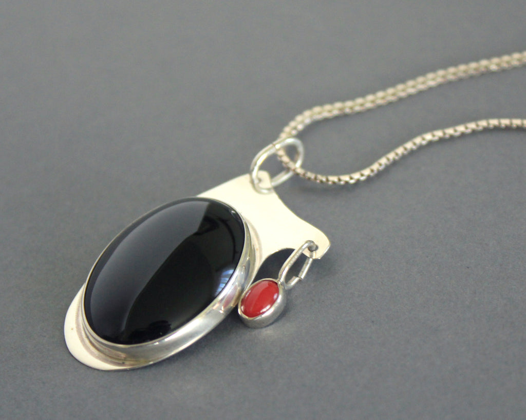signed modern sterling silver and black pendant