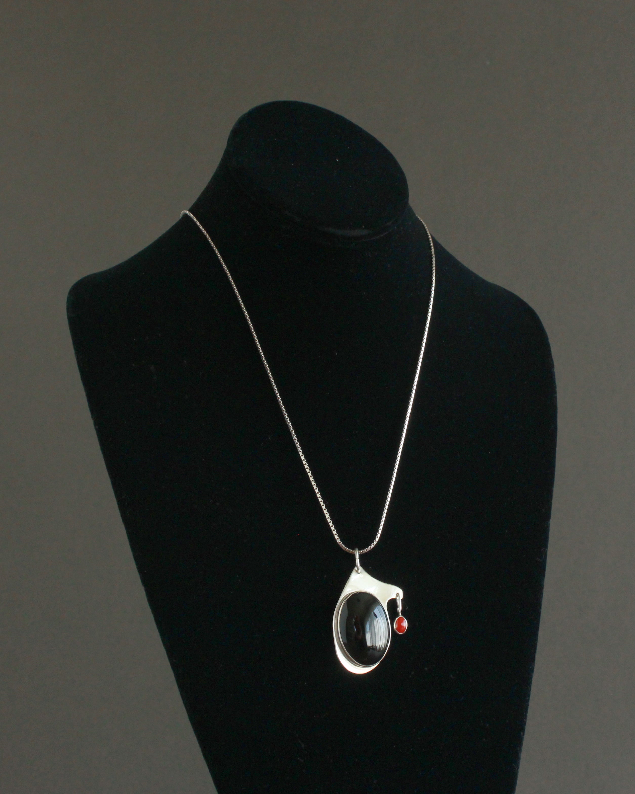 signed modern sterling silver and black pendant