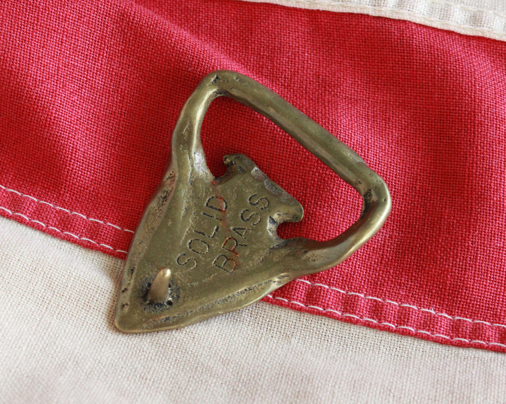 solid brass arrowhead shaped bottle opener belt buckle 