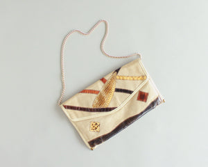 Retro 1970's envelope purse with snakeskin patches and gold chain