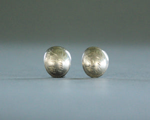 Engraved silver concho earrings