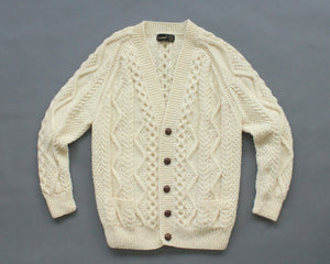 Irish wool cable knit cardigan with deep v neck and brown buttons 