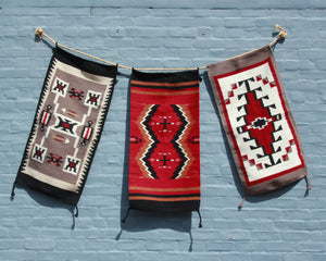 Hand woven wool doormats in geometric Southwest inspired prints 