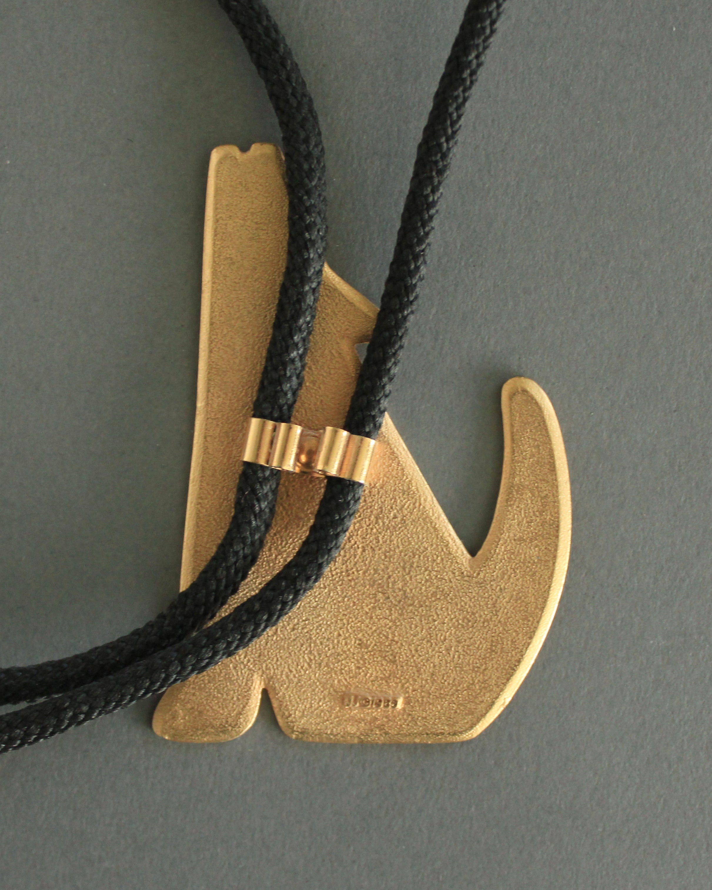 gold howling coyote 80s bolo tie 