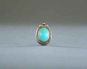 affordable sterling silver and turquoise colored pendant
