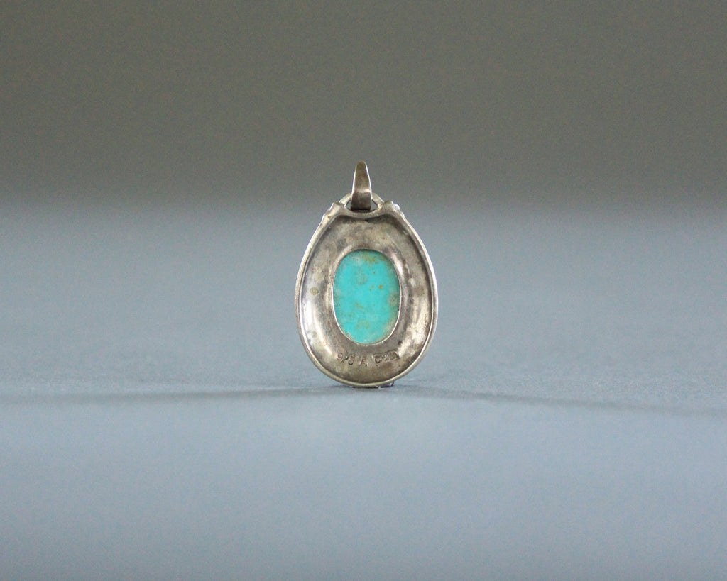 affordable sterling silver and turquoise colored pendant