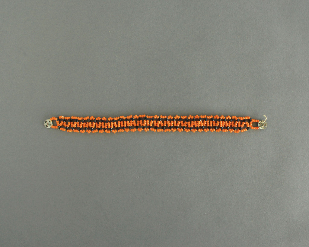 Handmade vintage orange and black beaded bracelet or anklet 