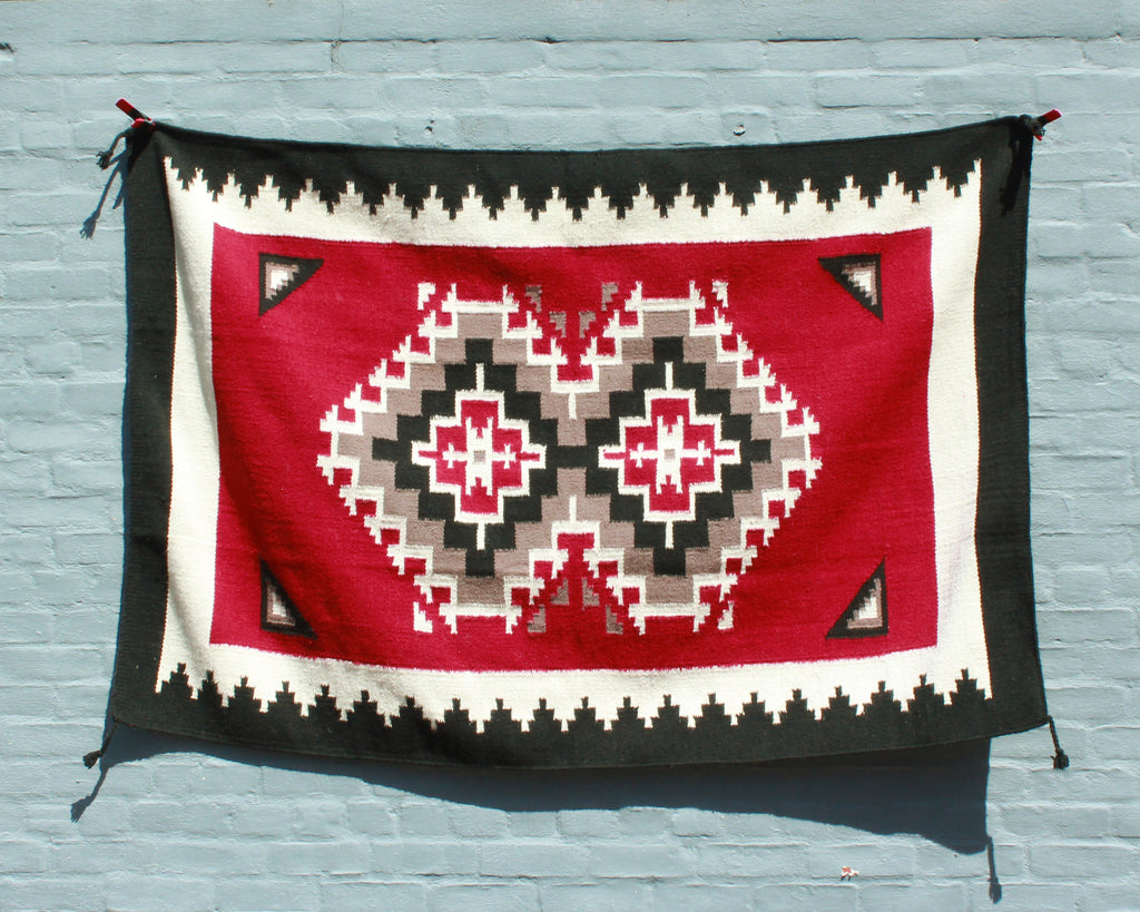 Large Southwest print wool area rug in red and black 