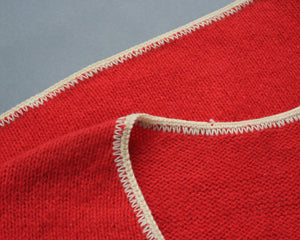 Vintage red wool pullover sweater vest with white trim 