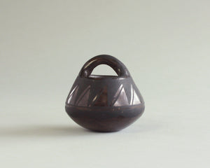 Mini black on black pottery basket by Josefina Martinez of Santo Domingo Pueblo, New Mexico (Kewa)