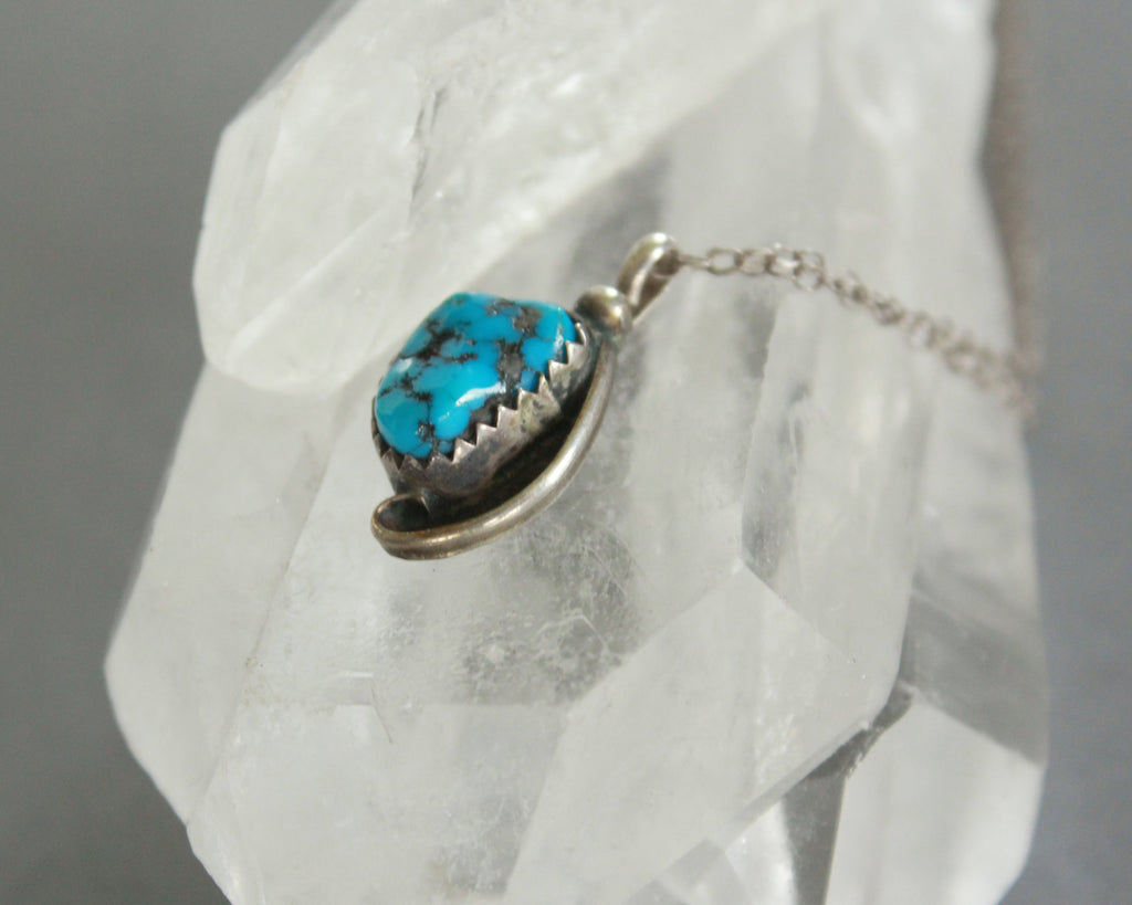 small Navajo signed turquoise silver pendant