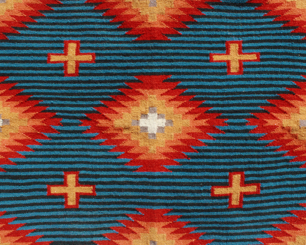 Hand woven southwest print saddle blanket in blue and orange