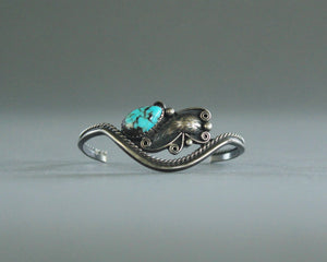 asymmetrical turquoise and silver bracelet 
