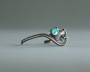asymmetrical turquoise and silver bracelet 