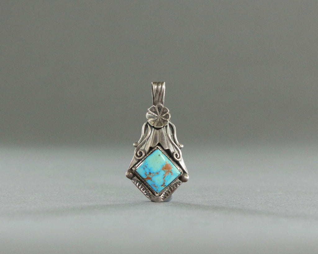 natural turquoise pendant with silver rose