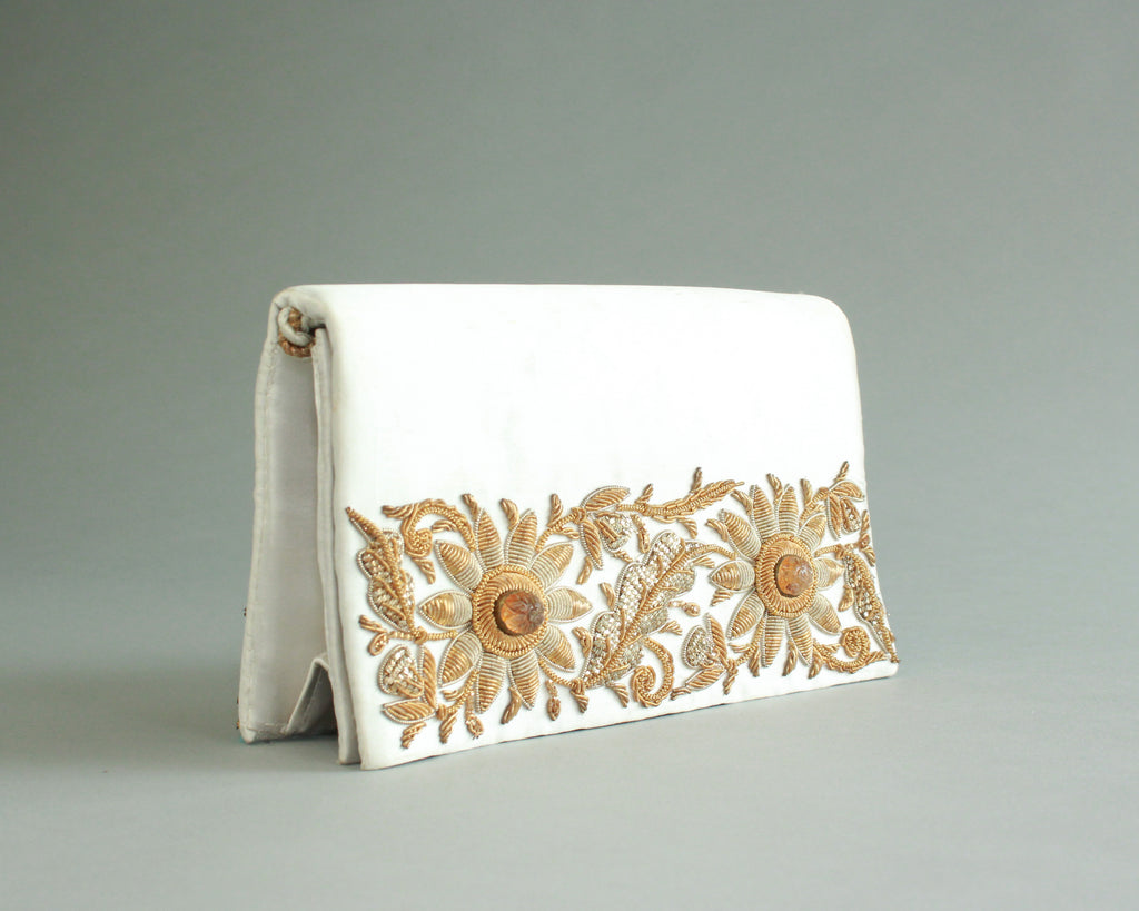 White satin purse with gold hand beading on both sides